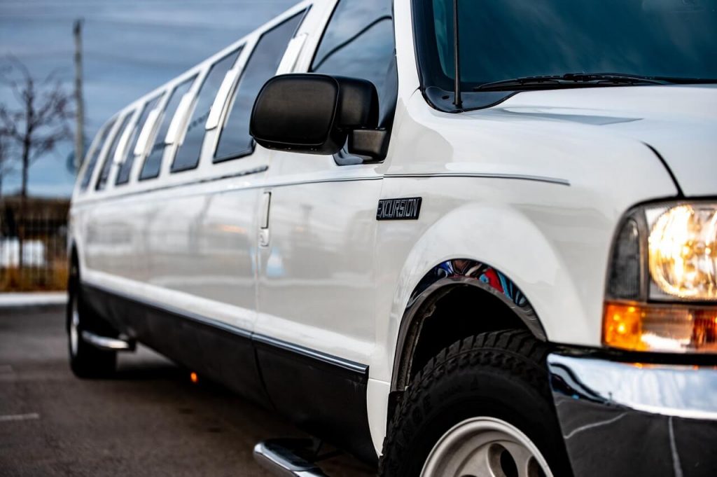 White Ford Excursion limousine